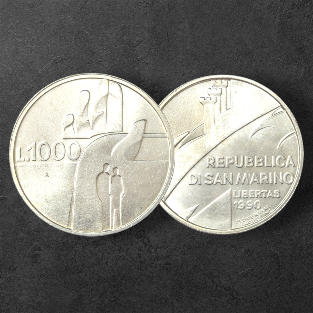 1990 San Marino 1000 Lire Silver Coin – 1,600 Years of History – Hand and Figures Design – KM#257